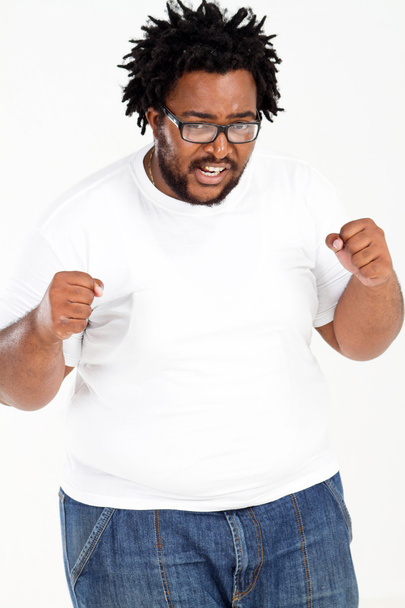 Enojado sobrepeso afroamericano hombre
 - Foto, imagen