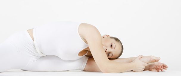 Portrait of ballet dancer doing stretching - Zdjęcie, obraz
