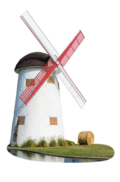 Moulin à vent et paille dans la pelouse
 - Photo, image