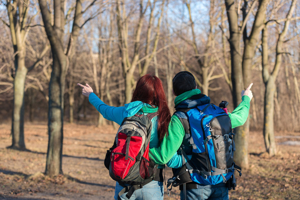 Young couple hiking with backpacks. - Photo, Image