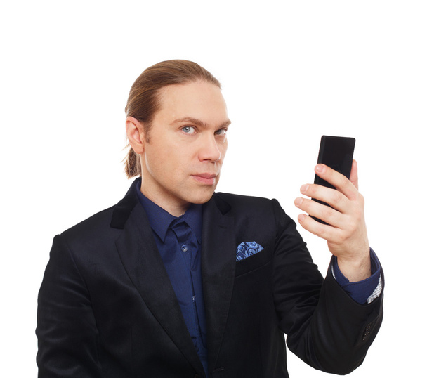 Stylish man in suit with mobile phone isolated. - Valokuva, kuva