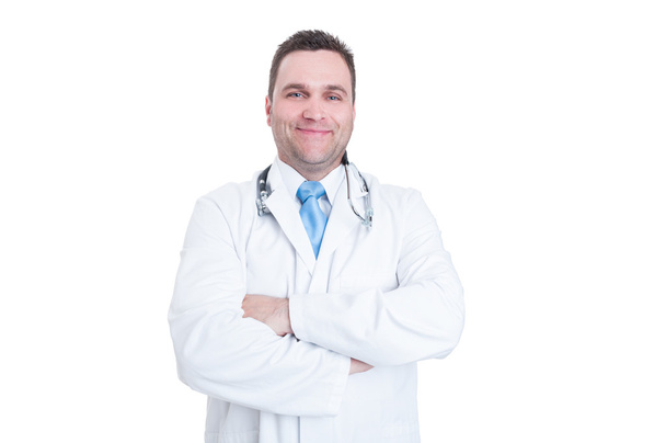 Male doctor standing arms crossed acting confident or successful - Фото, изображение