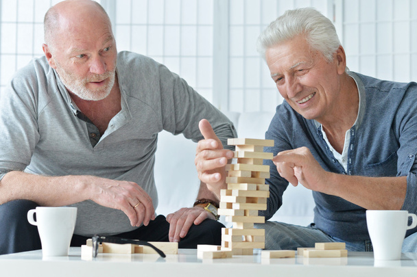 senior men playing  board game - Zdjęcie, obraz
