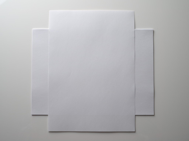 paper a4 on a grey background - Foto, imagen