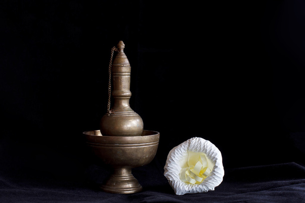 Still life photography by small contrainer and flower - Photo, Image