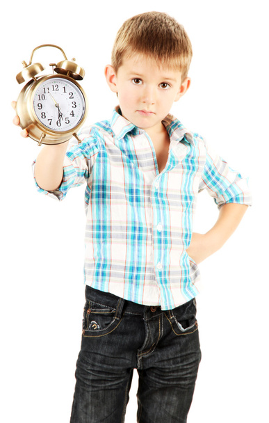 Funny little boy with alarm clock isolated on white - Photo, Image