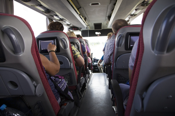 Туристический автобус Интерьер. Люди едут на гастроли
 - Фото, изображение