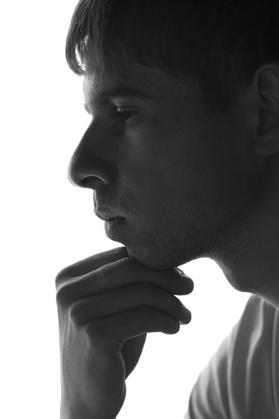 sad man silhouette on a white background - Fotografie, Obrázek
