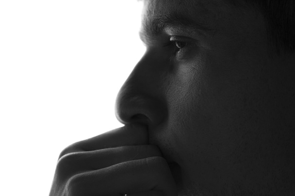traurige Männersilhouette auf weißem Hintergrund - Foto, Bild