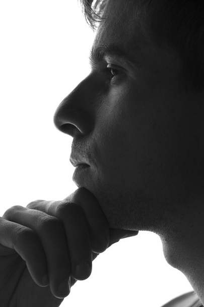 sad man silhouette on a white background - Photo, image
