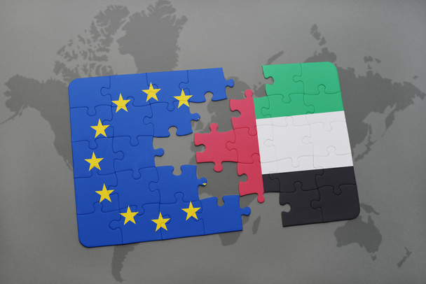 rompecabezas con la bandera nacional de los emiratos árabes unidos y la unión europea en un mapa del mundo
 - Foto, imagen