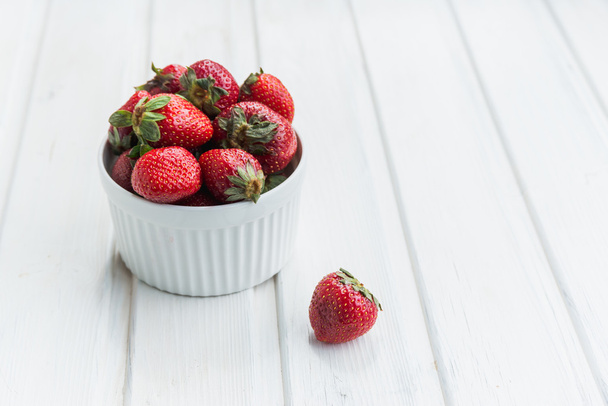 strawberries in white bowl - Photo, image