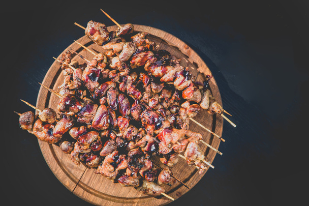 meat kebab skewers on the grill, chicken hearts, - Φωτογραφία, εικόνα
