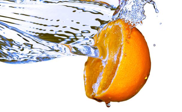 respingo de água na laranja
 - Foto, Imagem