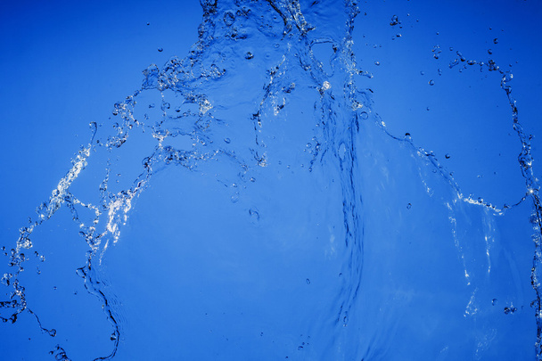 Waterfall on a blue  background - Foto, Bild