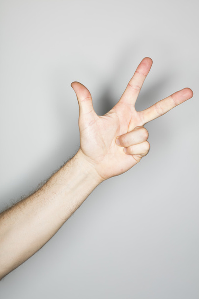 белый мужчина делает изолированный жест рукой
  - Фото, изображение