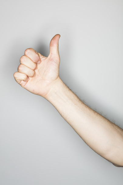 белый мужчина делает изолированный жест рукой
  - Фото, изображение