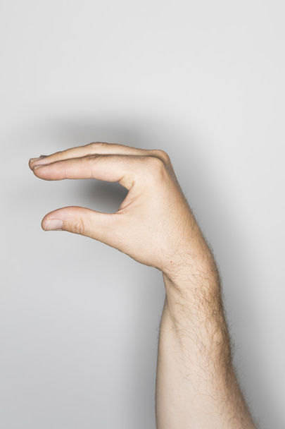 gebaar met een hand van een Kaukasische  - Foto, afbeelding
