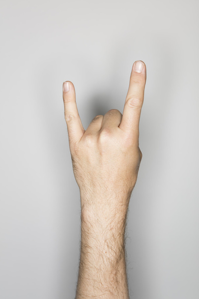 gesto con la mano de un hombre caucásico
 - Foto, Imagen