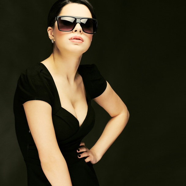 Elegant sexual woman in black clothes in fashion style - Photo, Image