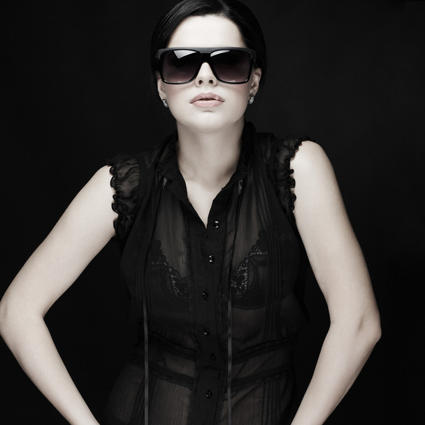 Elegant sexual woman in black clothes in fashion style - Фото, зображення
