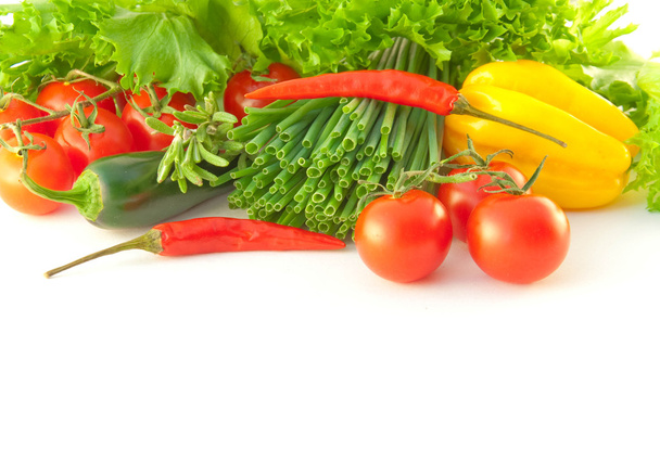 Tomatoes, an onion, pepper and salad - Фото, изображение
