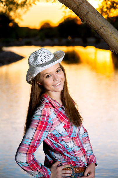 Teenage Cowgirl at Sunset - Φωτογραφία, εικόνα