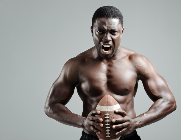 Well-built american football player - Photo, image