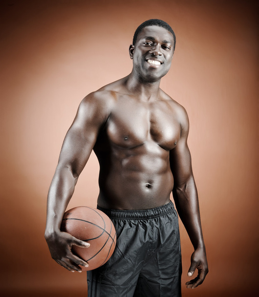 Smiling basketball player - Фото, зображення