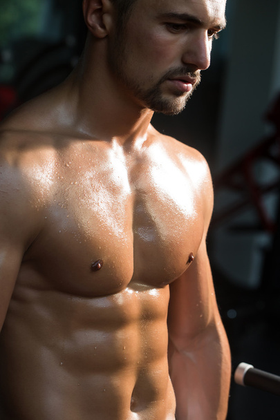 muscular male wet torso - Фото, изображение