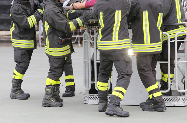 firefighters in the fire truck basket during the practice of tra - Photo, Image