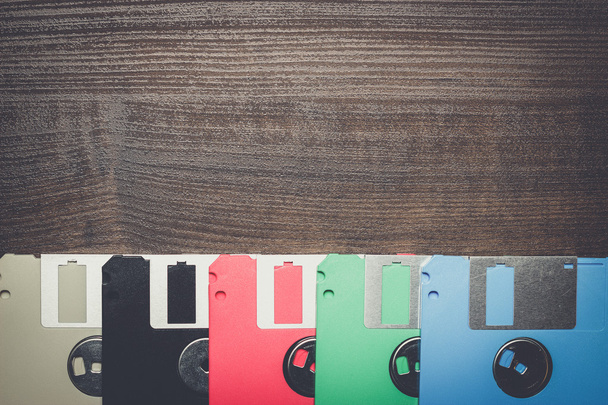 retro technology concept diskette on wooden background - Zdjęcie, obraz