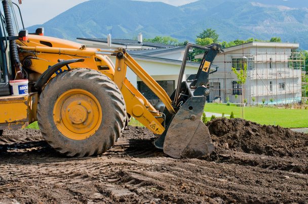 Trabajos de tierra con maquinaria pesada
 - Foto, Imagen