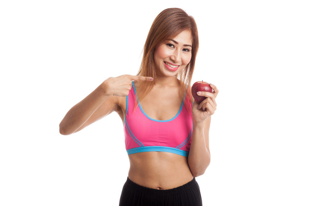 Beautiful Asian healthy girl point to red apple - Foto, immagini