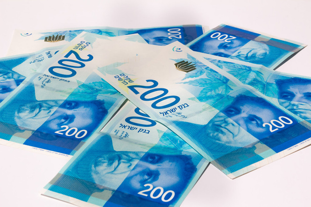 Stack de contas de dinheiro israelenses de 200 shekel
  - Foto, Imagem
