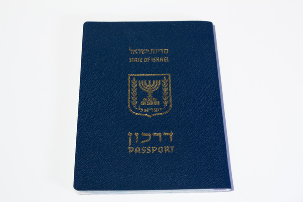 Паспорт гражданина Израиля на белом фоне - вид сверху
 - Фото, изображение