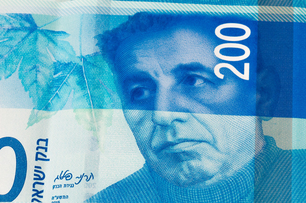 Montón de billetes israelíes de 200 shekel - vista superior
 - Foto, imagen