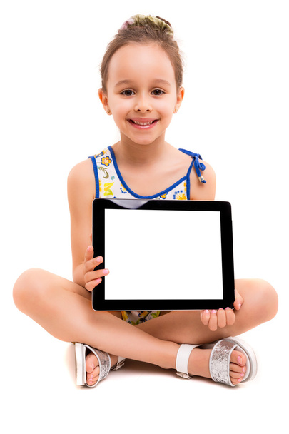 Petite fille avec un nouvel ordinateur tablette
 - Photo, image