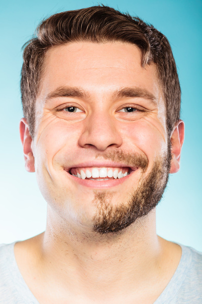 Happy man with half shaved face beard hair. - Fotoğraf, Görsel