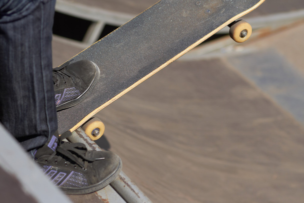 Skater ready to roll-in on a quaterpipe - Photo, image