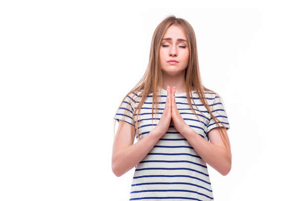 Girl pray on white  - Foto, imagen