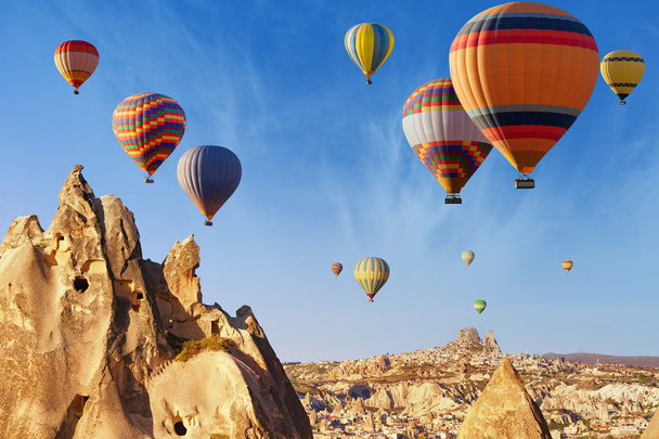 Hot air ballooning near Uchisar castle, Cappadocia - 写真・画像