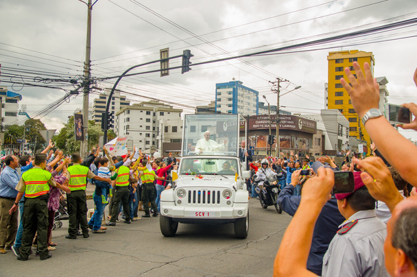 QUITO, ECUADOR - JULY 7, 2015: Welcome pope Francsico to Ecuador, people on the streets trying to see and touch him - Photo, image