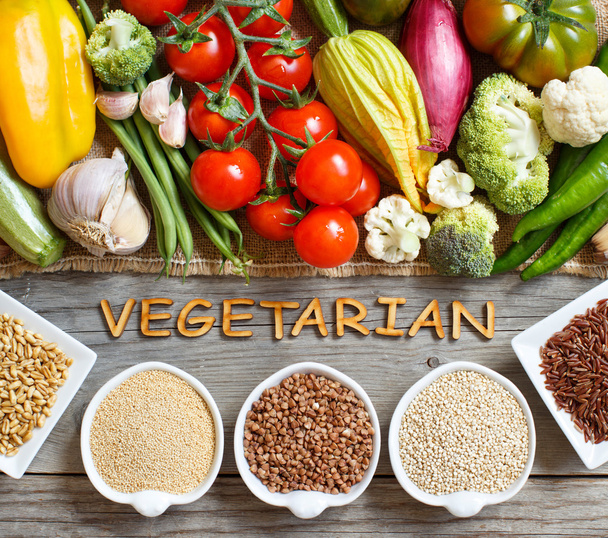 Fresh vegetables and cereals with word Vegetarian - Photo, Image