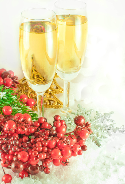 Christmas champagne and branch of berries with a fur-tree - Photo, Image