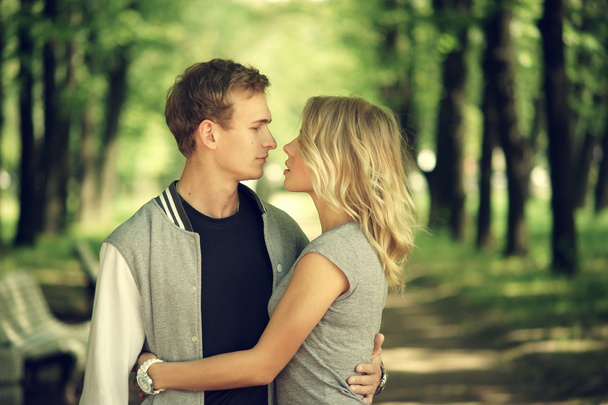 lovely couple hugging in summer park - Photo, Image