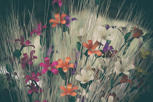 Värikäs keinotekoinen kukka
 - Valokuva, kuva