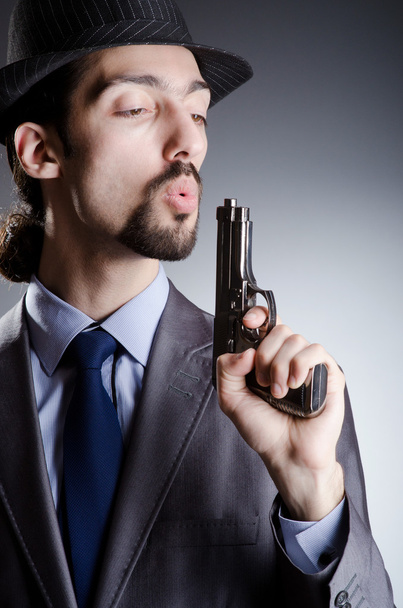 Businessman man with hand gun - Photo, Image