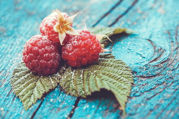Fresh raspberry on a wooden table - Photo, Image