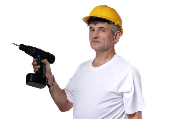 Builder with holding drill isolated on white - Фото, изображение